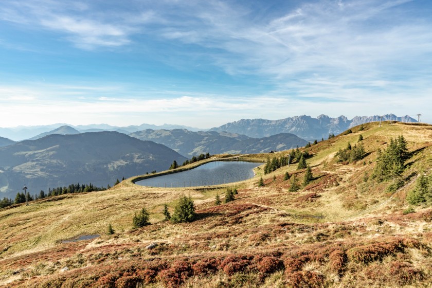 Explore the beautiful mountain landscape among colourful leaves in autumn