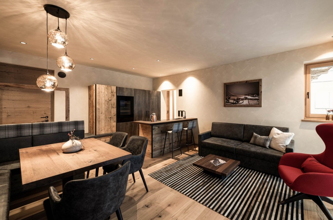 Living and dining area with cosy seating area and modern kitchen