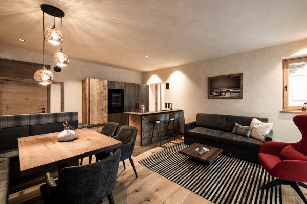 Living and dining area with cosy seating area and modern kitchen