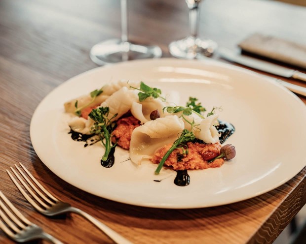 La Monte Apartments und Bistrot - Teller mit kulinarischen Köstlichkeiten im hauseigenen Bistrot