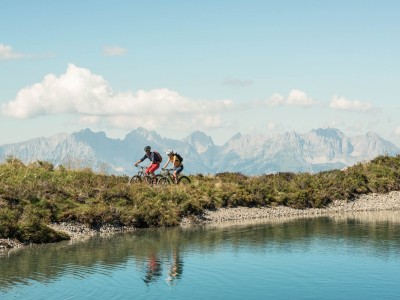 Explore beautiful mountain landscapes and lakes by bike