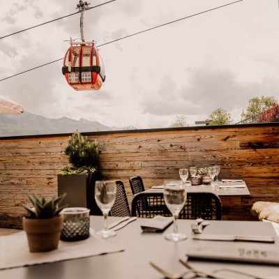 Enjoy dinner on the terrace overlooking the gondola